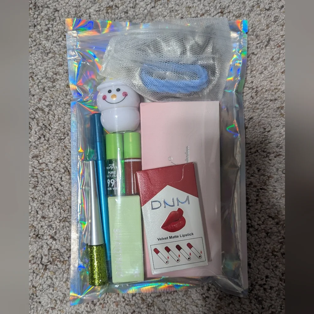 Makeup Bag with Assorted Cosmetics + Mystery Bag Of Goodies